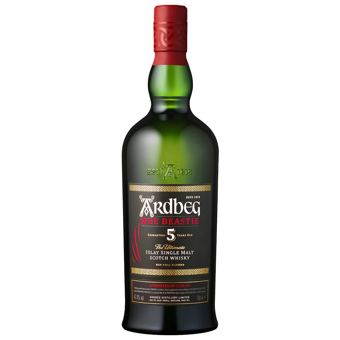 A bottle of Ardbeg 5 Wee Beastie Single Malt Scotch Whisky with a green label and red cap.