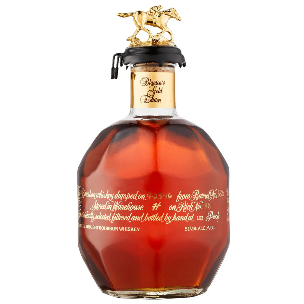 Blantons gold whisky bottle in the white background