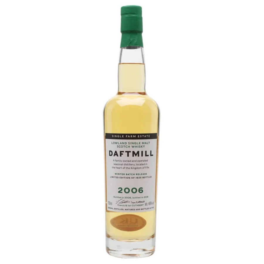 Daftmill whisky bottle with green cap on a white background
