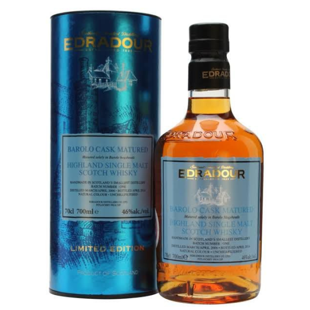 A bottle of Edradour Barolo Cask single malt Scotch whisky next to its blue and silver packaging.