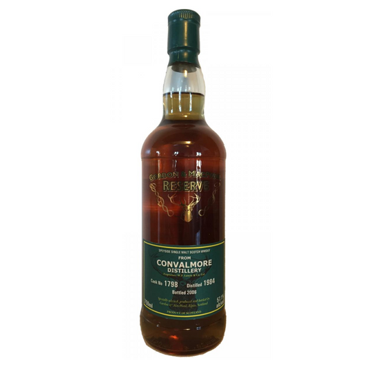 A bottle of Gordon MacPhail Convalmore 1984 21 Year Old Cask Strength Single Malt Scotch Whisky, with a green label and gold text.