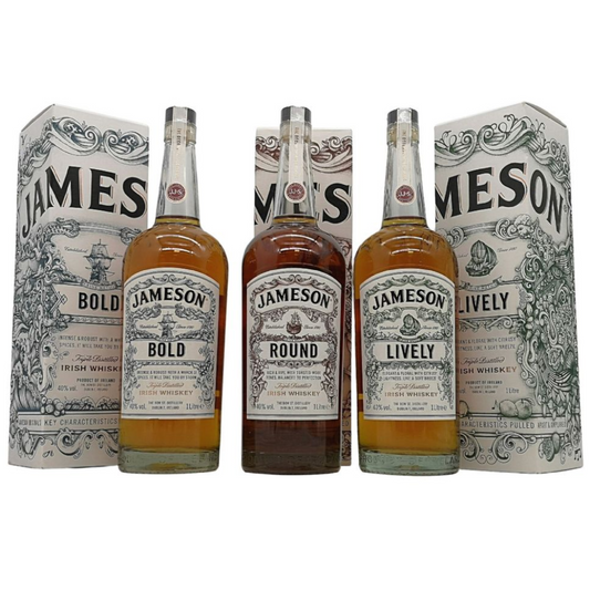 Three bottles of Jameson Irish whiskey, each labeled differently: Bold, Lively, and Round, displayed in a line with the brand's packaging behind each bottle.