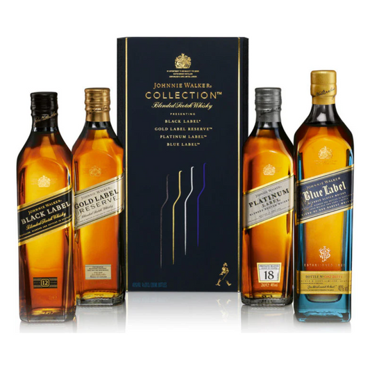 A collection of Johnnie Walker whiskey bottles within a gift set, including Black Label, Gold Label Reserve, Platinum Label, and Blue Label varieties.