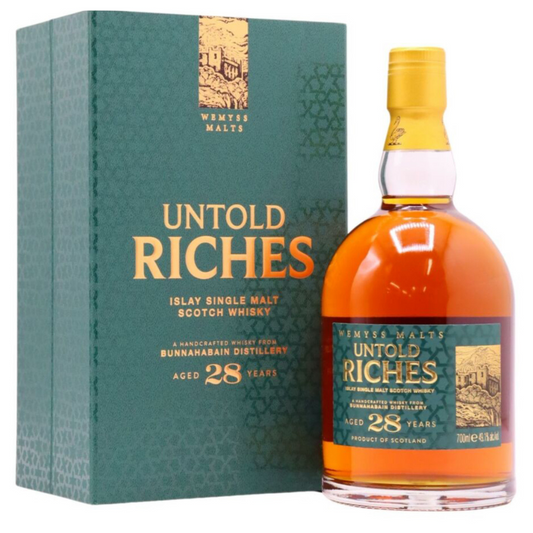 Untold Riches 28-year-old Islay single malt Scotch whisky bottle and box on a white background