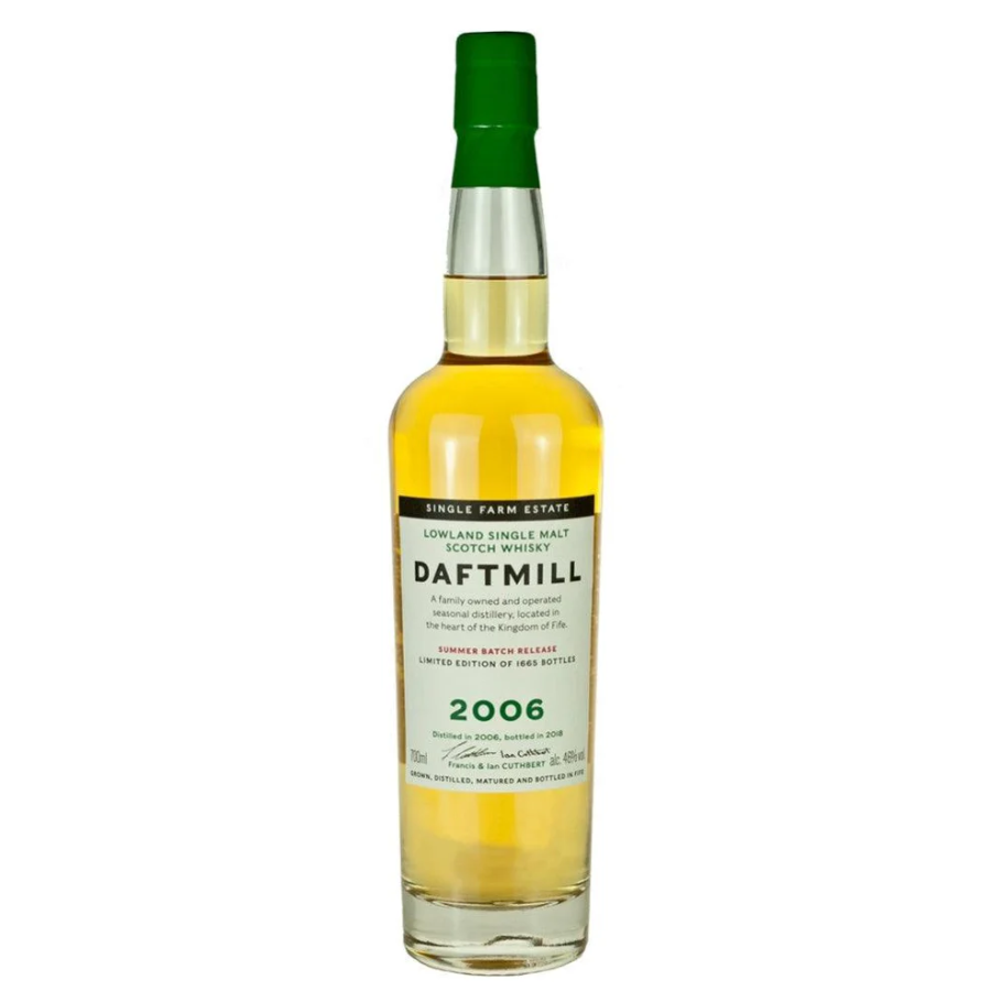 Daftmill whisky bottle with green cap on a white background