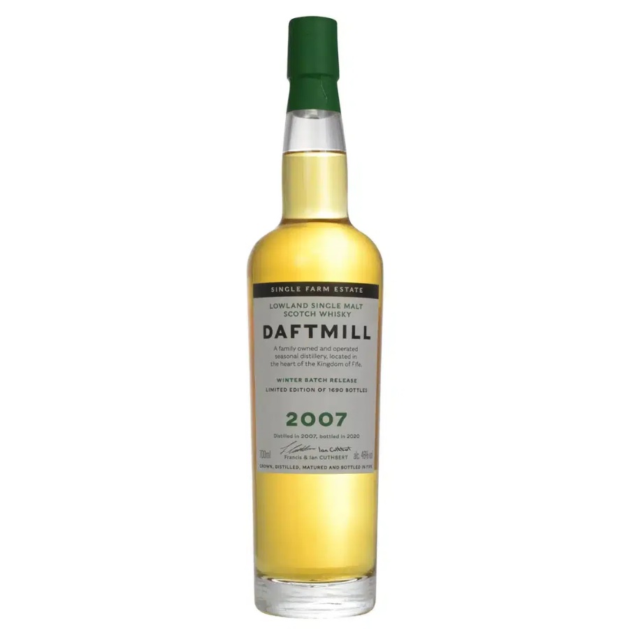 Daftmill whisky bottle with green cap on a white background