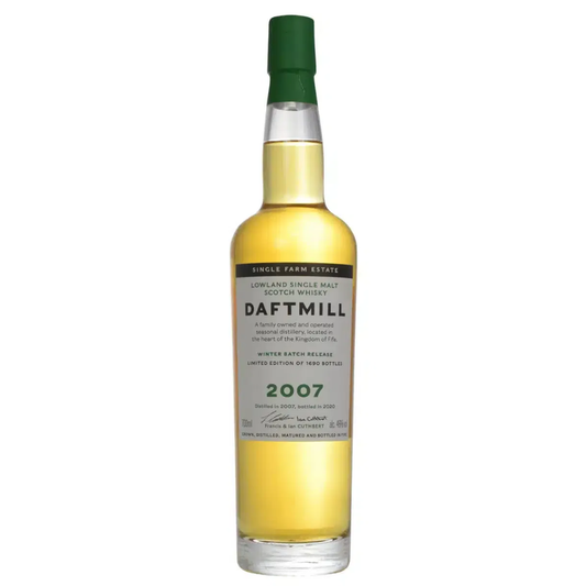 Daftmill whisky bottle with green cap on a white background