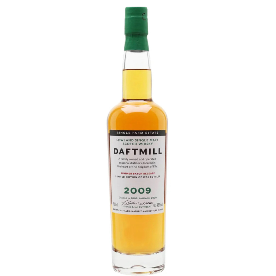Bottle of Daftmill whisky with a green cap on a white background