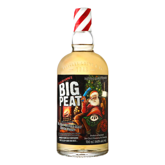 A bottle of Douglas Laing's Big Peat Xmas Edition 2016 Islay Blended Malt Scotch Whisky with a festive label featuring Santa Claus and reindeer on a bottle with a red and white striped twist-top cap.