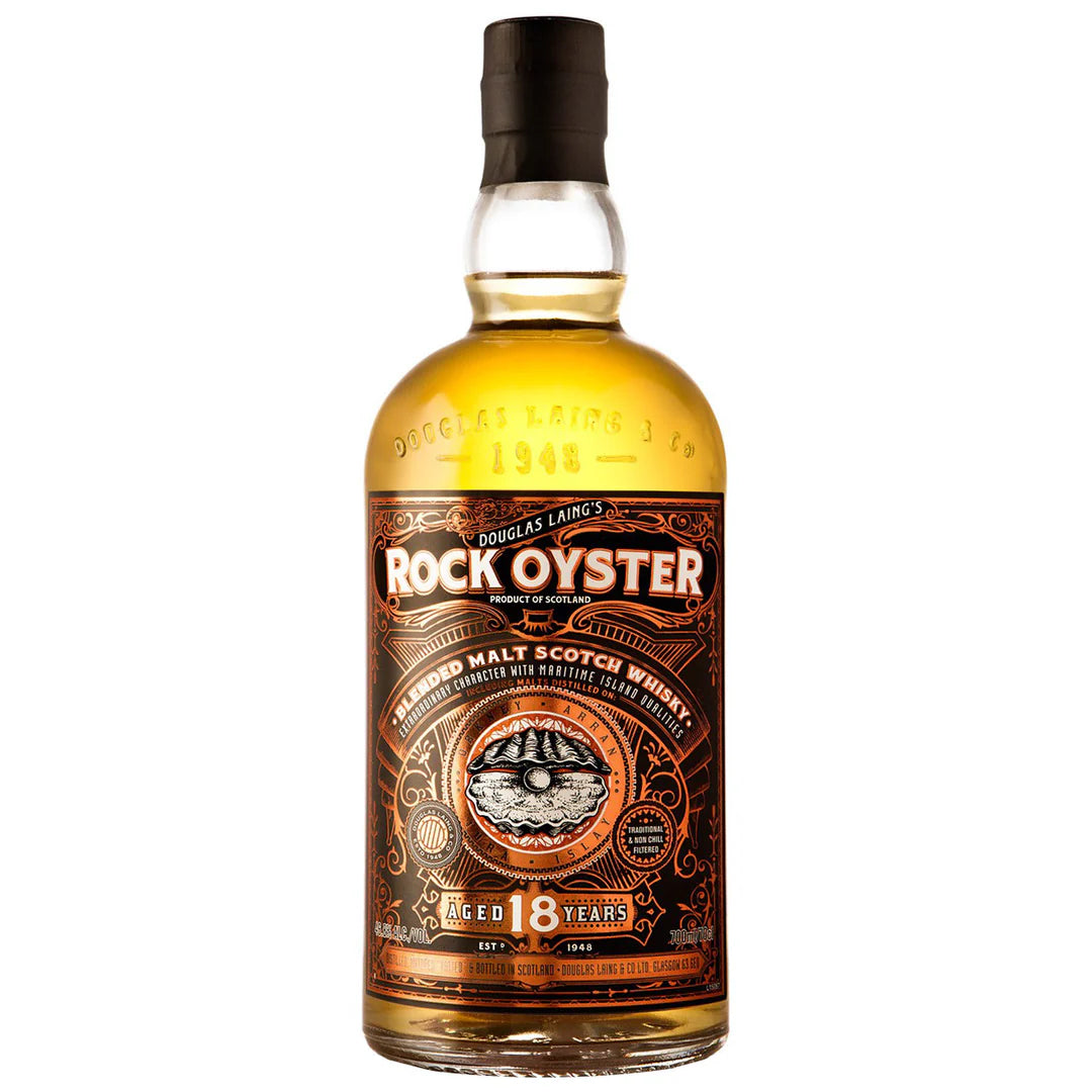 A bottle of Douglas Laing's Rock Oyster 18 Scotch whisky with a detailed, vintage-style label.