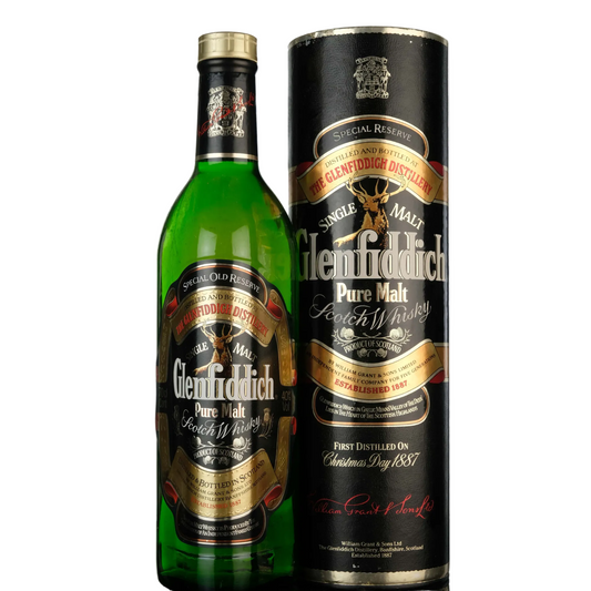 Glenfiddich Pure Malt Scotch Whisky bottle and packaging on a white background