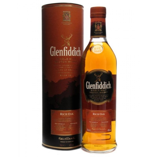 Glenfiddich Rich Oak 14yo whisky bottle and packaging on a white background