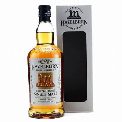 A bottle of Hazelburn CV single malt Scotch whisky with its packaging box.