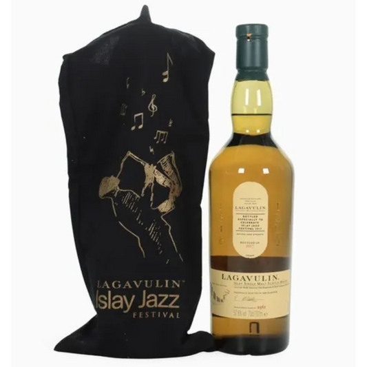 Lagavulin whisky bottle with a black bag featuring music notes and a silhouette of a person playing an instrument.