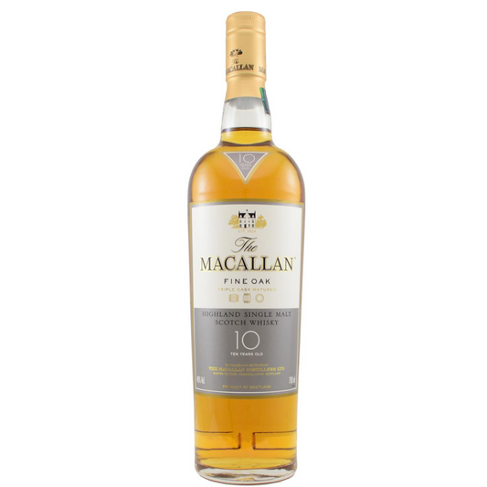 A bottle of Macallan 10 Year Old Fine Oak single malt Scotch whisky with a gold and white label, against a plain background.