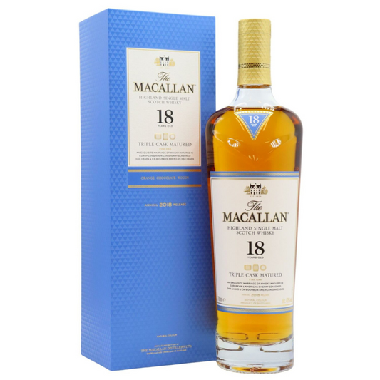 The Macallan 18-year-old whisky bottle and box on a white background