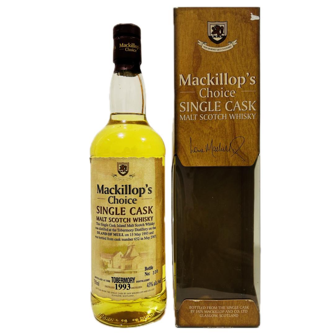 A bottle of Mackillop's Choice Single Cask Islay Single Malt Scotch Whisky, with a wooden box packaging. The bottle is labeled with the product name and the distillation year 1993.