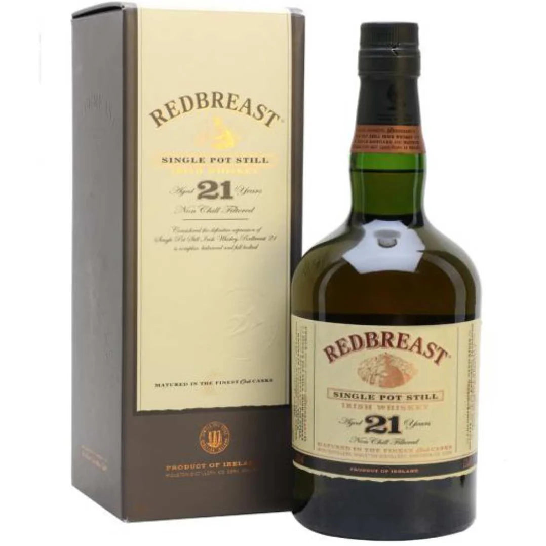 A bottle of Redbreast 21 Year Old Irish whiskey next to its packaging box.