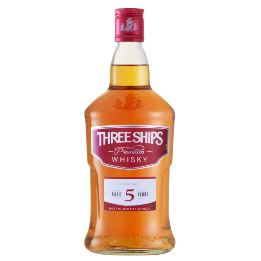 Three Ships Premium Whisky bottle with a red cap on a white background