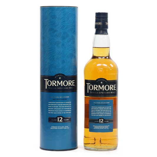 Tormore whisky bottle and blue cylindrical box on a white background