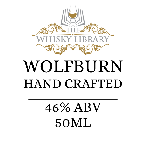 Wolfburn handcrafted whisky label with 'The Whisky Library' branding on a white background.